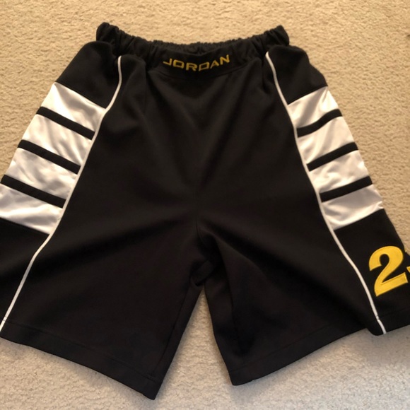 white and gold jordan shorts